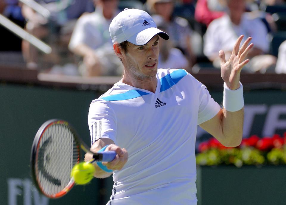 Andy Murray, of Great Britain, returns a hit by Jiri Vesely, of Czech Republic, during a third round match at the BNP Paribas Open tennis tournament, Monday, March 10, 2014, in Indian Wells, Calif. (AP Photo/Mark J. Terrill)