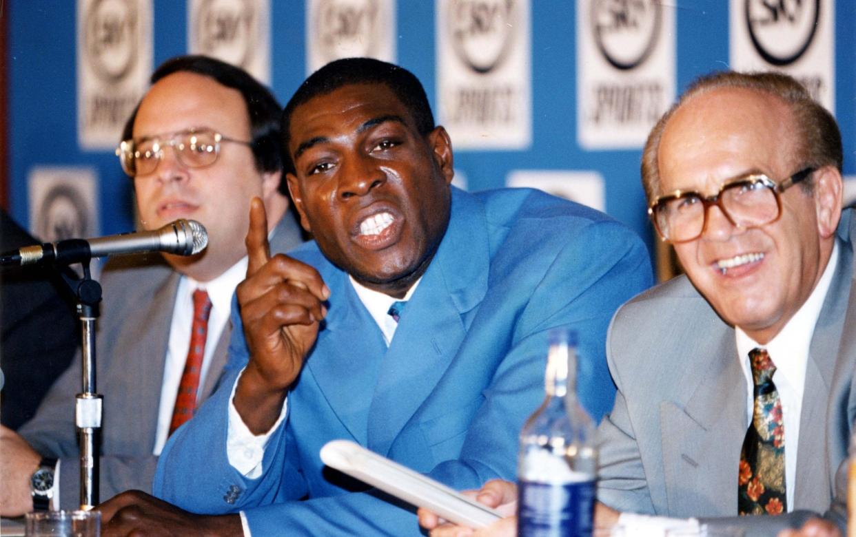 Frank Bruno's Promoter Mickey Duff Claimed Yesterday That World Champion Lennox Lewis Had Wasted Money By Staging October's Wbc Heavyweight Bout At Cardiff Arms Park Instead Of Wembley Stadium.