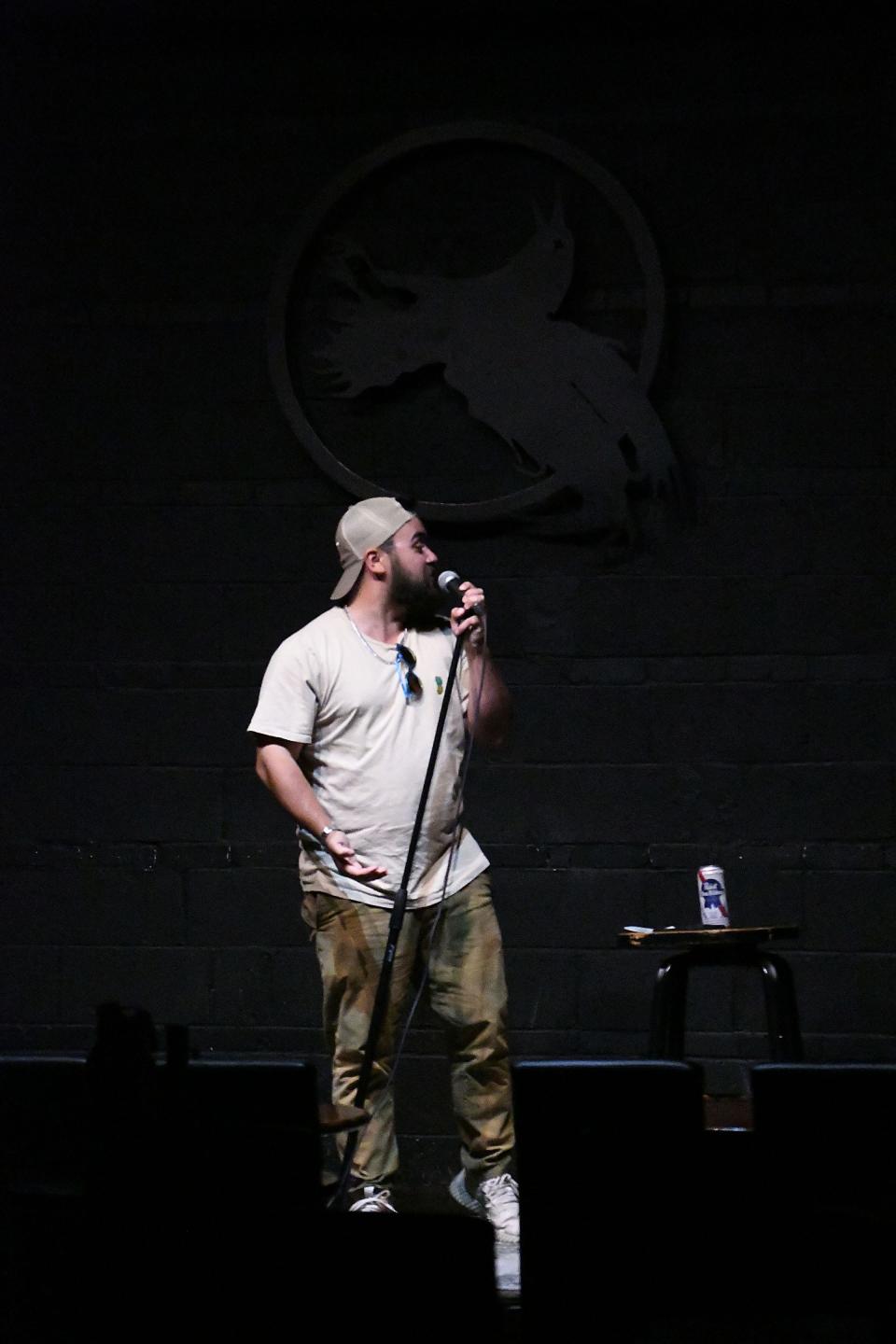 Paul Baeza opens the show as its host inside the Dead Crow Comedy Room on May 2 during open mic night in downtown Wilmington.