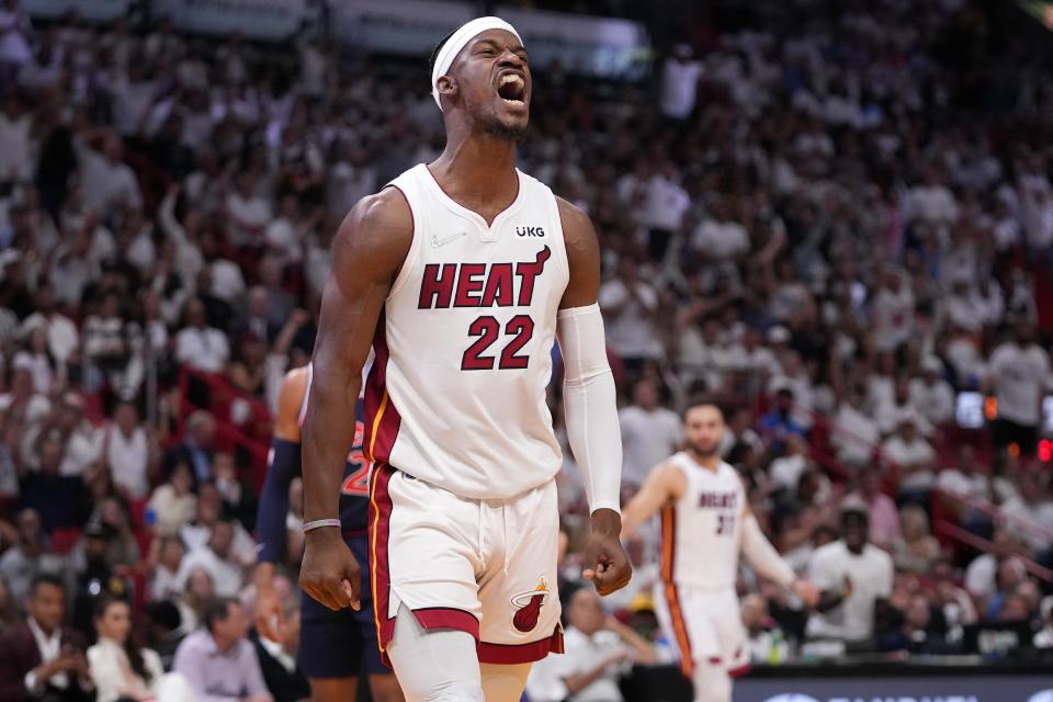 Second round: Heat forward Jimmy Butler gets fired up after a big second-half basket against the Sixers in Game 5.