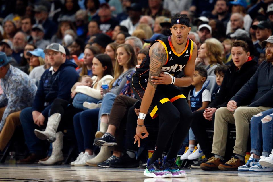 Jan 16, 2023; Memphis, Tennessee, USA; Phoenix Suns guard Damion Lee (10) reacts after a three-point basket during the first half against the Memphis Grizzlies at FedExForum.