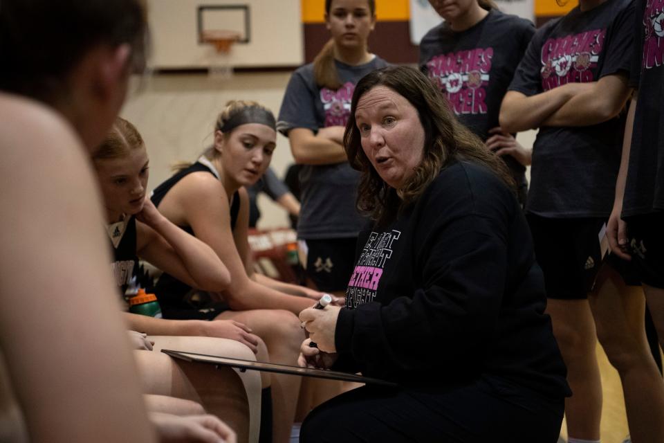 Washington Head Coach Gretchen Miles gives direction during a timeout as they play the Gibson Southern Titans Saturday, Jan. 13, 2024.
