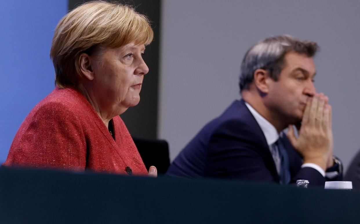 German Chancellor Angela Merkel and Bavarian Federal State Premier Markus Soeder