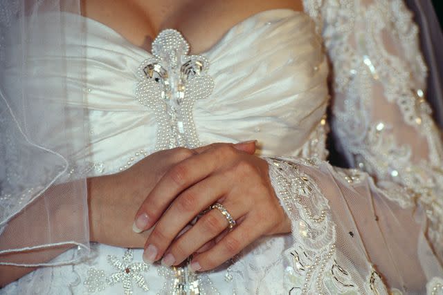 <p>Laurence Labat/Sygma/Getty</p> Celine Dion during her wedding ceremony to Rene Angelil on December 17, 1994.