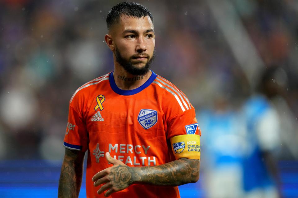 FC Cincinnati midfielder Luciano Acosta (10) walks to deliver a corner kick during the second half of an MLS soccer game against Charlotte FC, Saturday, Sept. 3, 2022, at TQL Stadium in Cincinnati. 