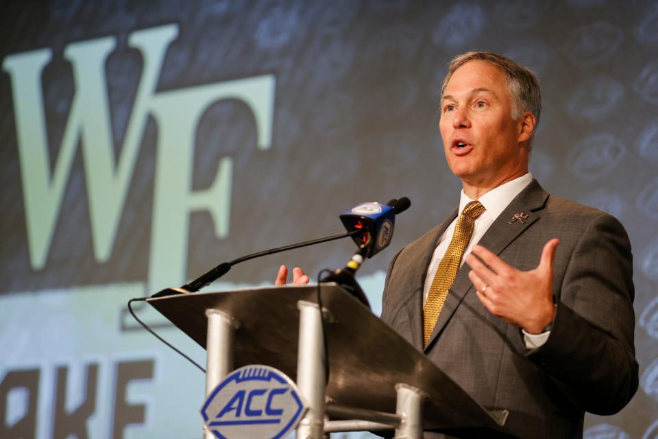 Wake Forest head coach Dave Clawson answers a question at the NCAA college football Atlantic Coast Conference Media Days in Charlotte, N.C., Wednesday, July 20, 2022. (AP Photo/Nell Redmond)