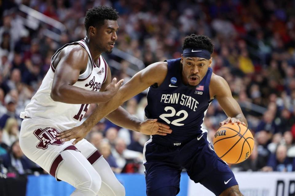 Penn State Nittany Lions guard Jalen Pickett (22) dribbles the ball against Texas A&amp;M Aggies guard Davin Watkins (22) during the first half of Thursday’s game at Wells Fargo Arena.