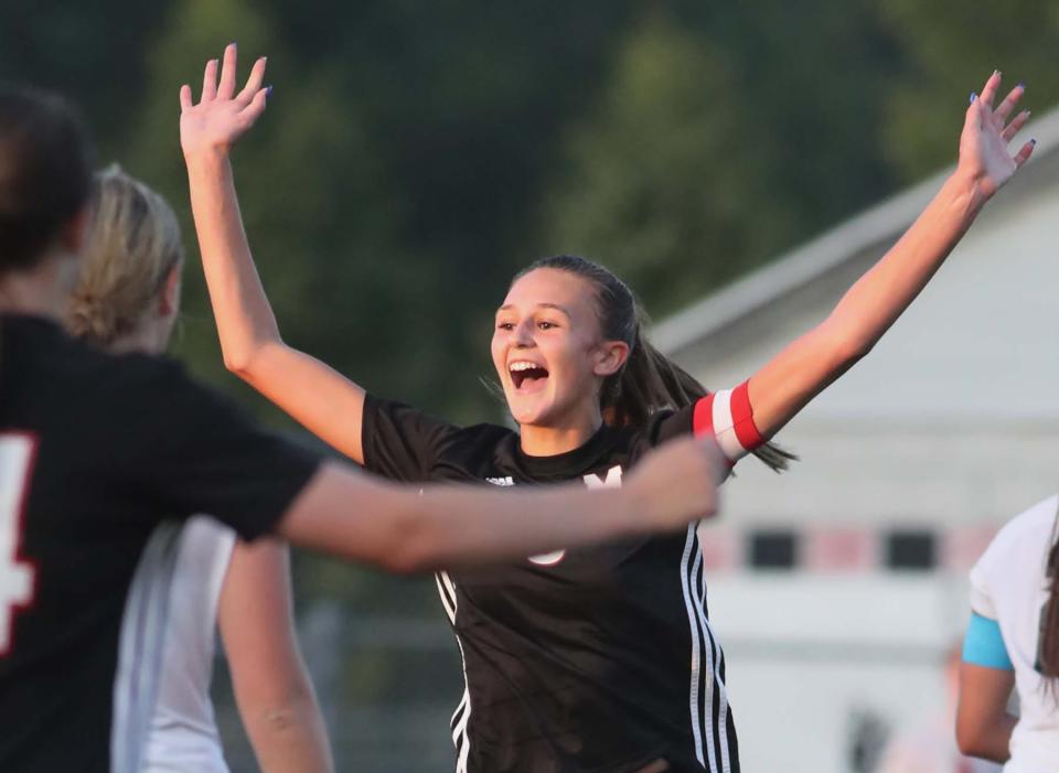 Kennedy Boal of Manchester reacts to scoring a goal against Hoban during the first half of their game at Manchester High School in New Franklin on Monday. 