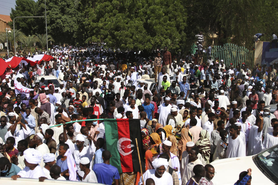 Sudanese protesters take part in a rally demanding the dissolution of the transitional government, outside the presidential palace in Khartoum, Sudan, Saturday, Oct. 16, 2021. (AP Photo/Marwan Ali)