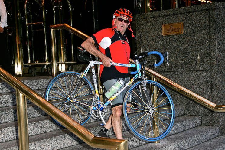 WIlliams carrying his bike out of a NYC hotel. (Photo: Bauer-Griffin/GC Images)