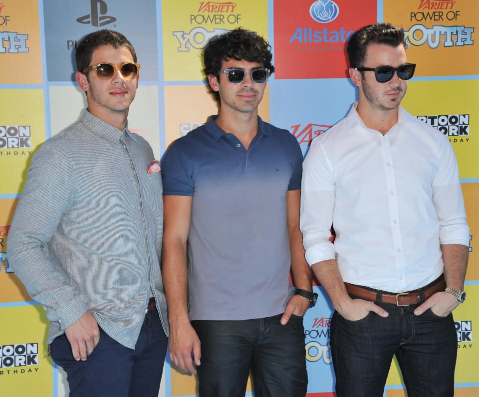 From left, Nick Jonas, Joe Jonas and Kevin Jonas attend Variety Power of Youth at Paramount Studios on Saturday, Sept. 15, 2012, in Los Angeles. (Photo by Richard Shotwell/Invision/AP)