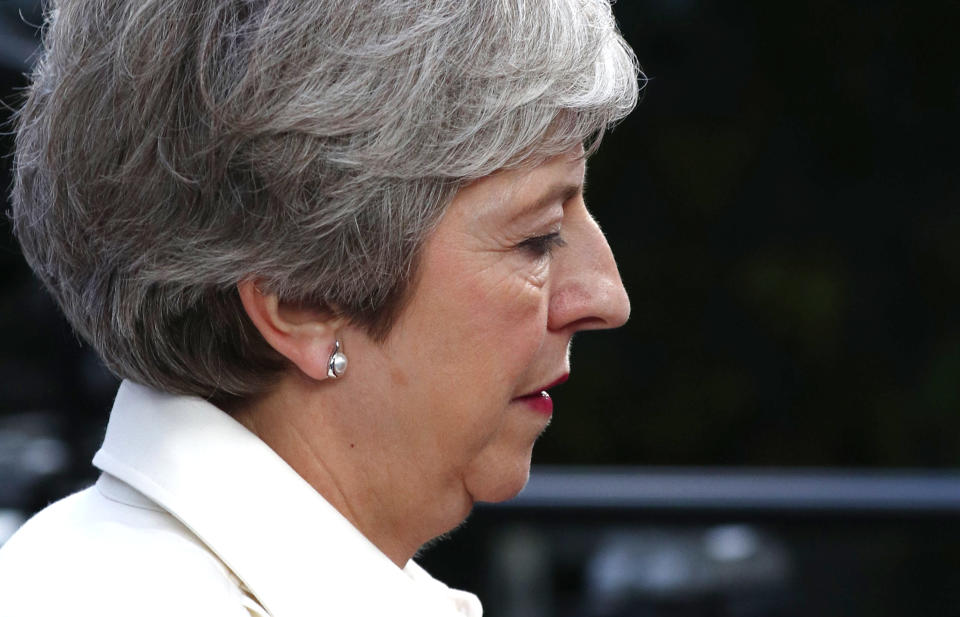 British Prime Minister Theresa May arrives for an EU summit in Brussels, Sunday, June 30, 2019. European Union leaders have started another marathon session of talks desperately seeking a breakthrough in a diplomatic fight over who should be picked for a half dozen of jobs at the top of EU institutions. (Francois Lenoir, Pool Photo via AP)