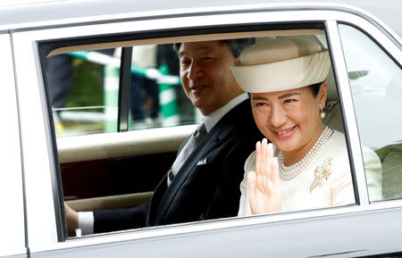 Japan’s new Empress Masako waves as she leaves the Imperial Palace in Tokyo, Japan May 1, 2019. REUTERS/Kim Kyung-Hoon