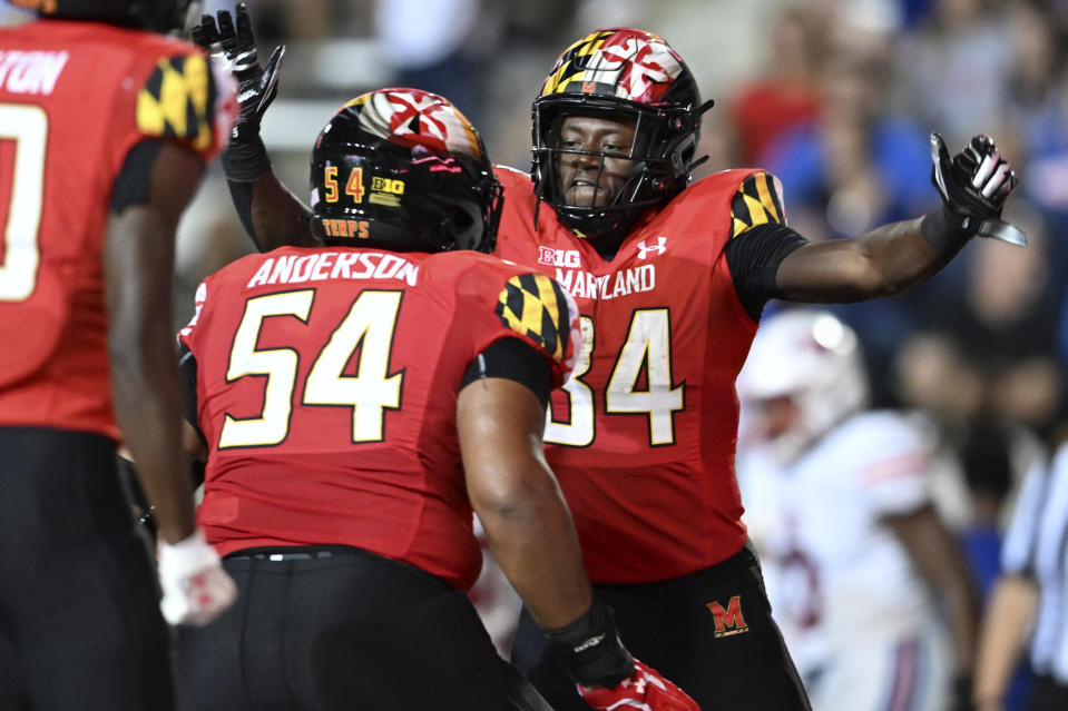 Maryland tight end Corey Dyches, right, celebrates his touchdown with Spencer Anderson in the second half of an NCAA college football game against SMU, Saturday, Sept. 17, 2022, in College Park, Md. (AP Photo/Gail Burton)