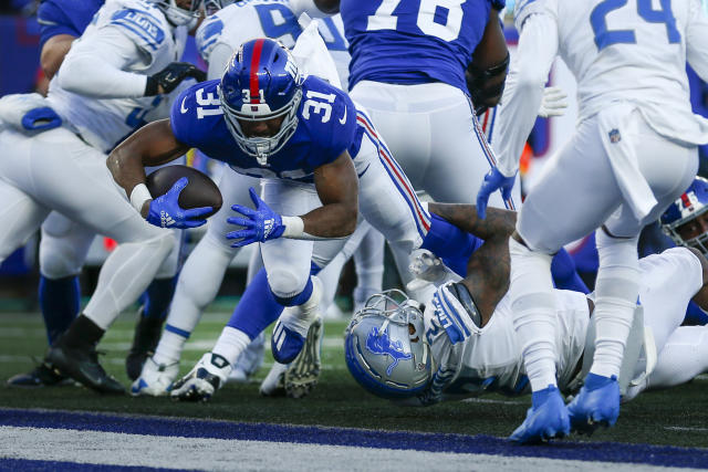 New York Giants guard Tyre Phillips (79) walks off the field at halftime of  an NFL