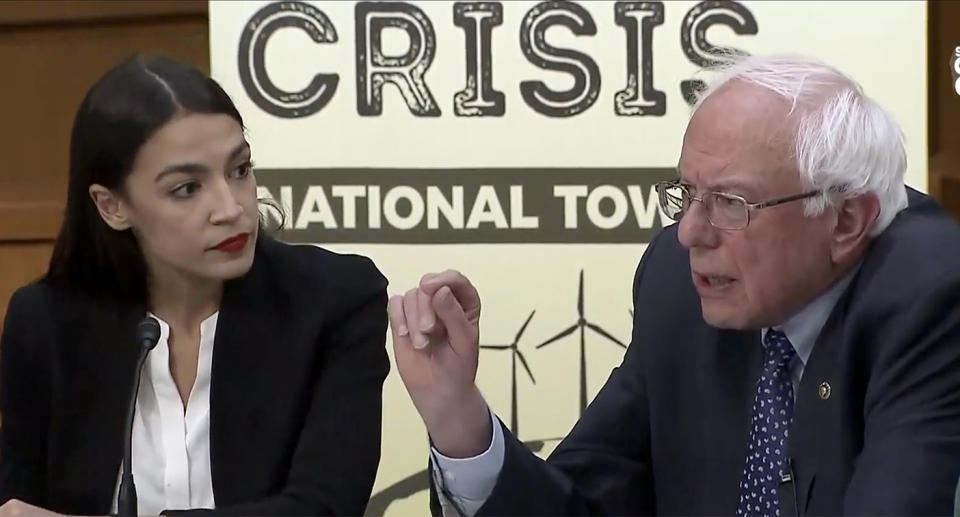 Bernie Sanders, I-Vt., moderates a discussion on climate change with Representative-elect Alexandria Ocasio-, D-N.Y., in Washington, D.C., on Dec. 3, 2018.