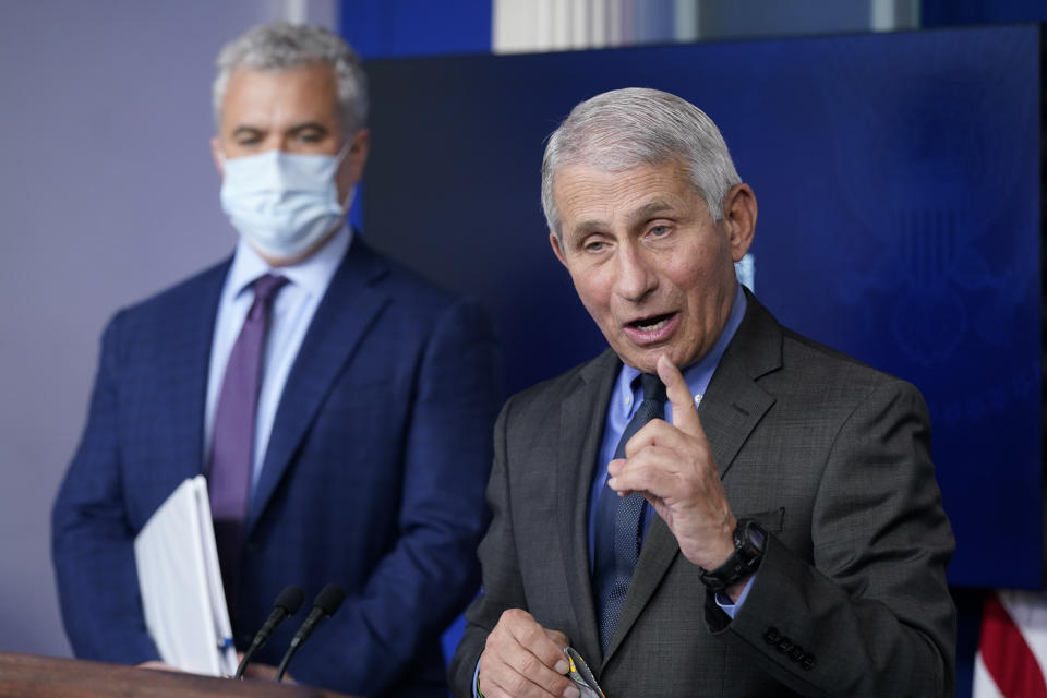 Dr. Anthony Fauci, director of the National Institute of Allergy and Infectious Diseases, speaks alongside White House COVID-19 Response Coordinator Jeff Zients during a press briefing at the White House, Tuesday, April 13, 2021, in Washington. (AP Photo/Patrick Semansky)