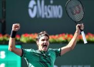 Mar 19, 2017; Indian Wells, CA, USA; Roger Federer (SUI) celebrates at match point as he defeated Stan Wawrinka (not pictured) 7-6, 6-4 in the men's final in the BNP Paribas Open at the Indian Wells Tennis Garden. Mandatory Credit: Jayne Kamin-Oncea-USA TODAY Sports