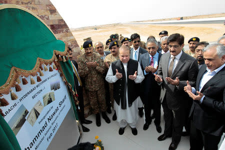 Pakistani Prime Minister Nawaz Sharif (C) attends a ceremony to inaugurate the M9 motorway between Karachi and Hyderabad, near Hyderabad ,Pakistan February 3, 2017. REUTERS/Caren Firouz