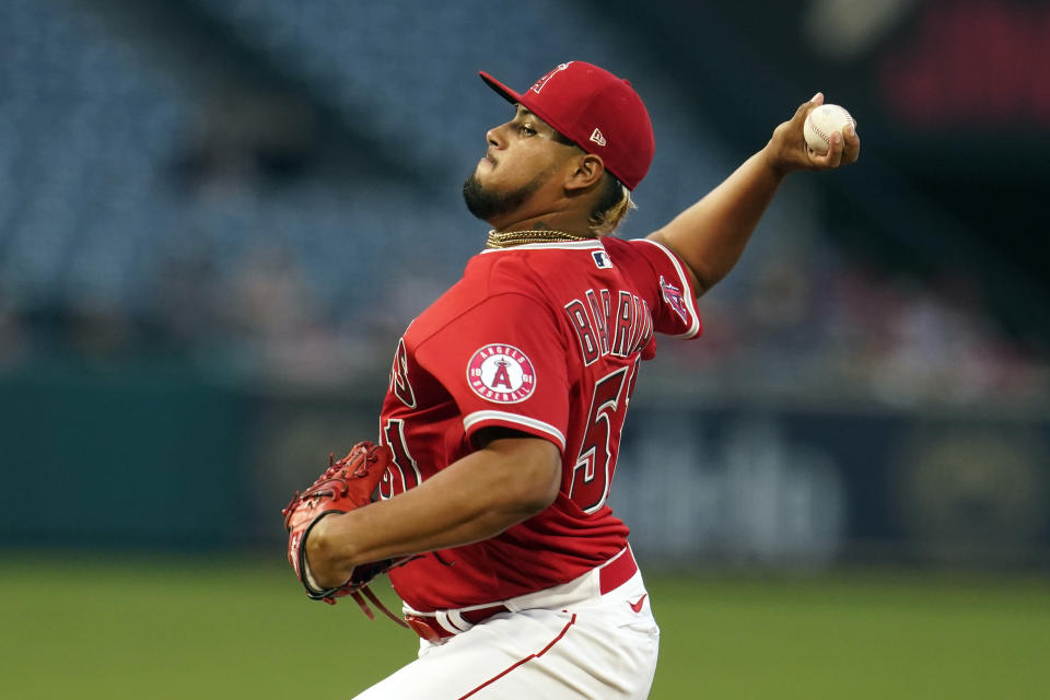 Los Angeles Angels starting pitcher Jaime Barria throws to a Houston Astros batter during the first inning of a baseball game Monday, Sept. 20, 2021, in Anaheim, Calif. (AP Photo/Marcio Jose Sanchez)