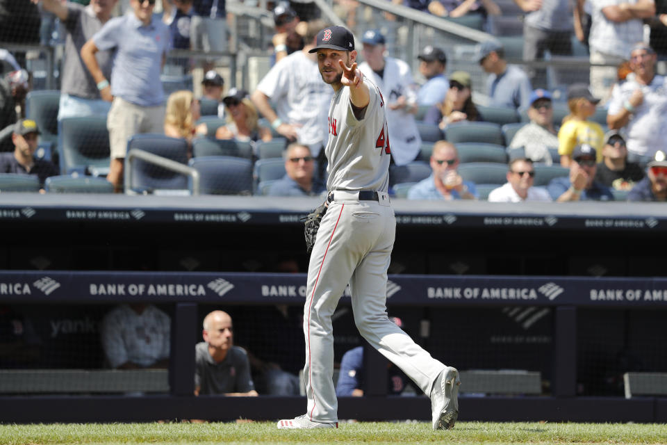 Boston Red Sox Chris Sale reacts to the umpires after being subbed out against the New York Yankees in the fourth inning of a baseball game, Saturday, Aug. 3, 2019, in New York. (AP Photo/Michael Owens)