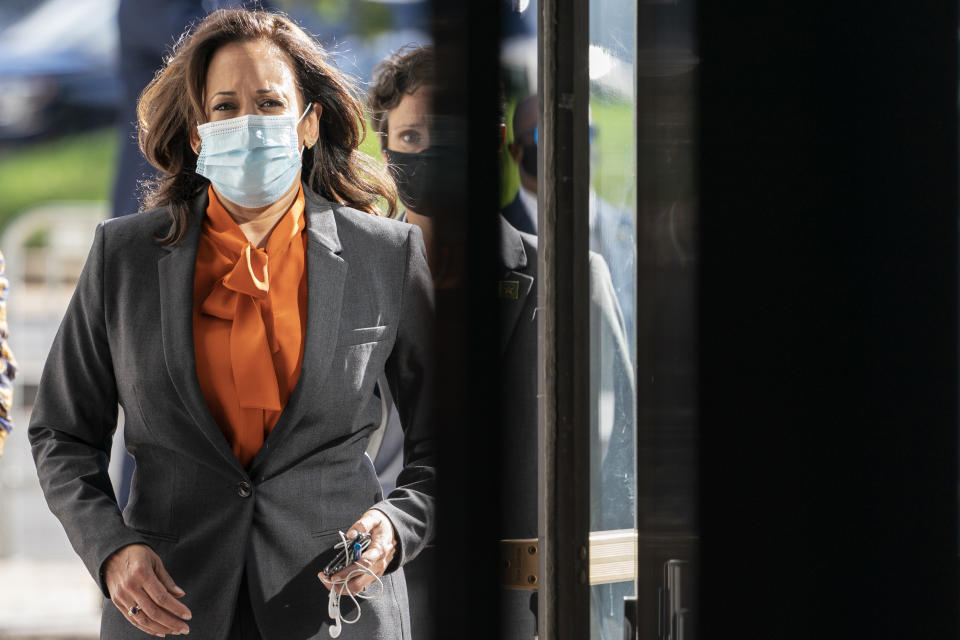 Democratic vice presidential candidate Sen. Kamala Harris, D-Calif., arrives on Capitol Hill for the confirmation hearing of Supreme Court nominee Amy Coney Barrett before the Senate Judiciary Committee, Tuesday, Oct. 13, 2020, in Washington. (AP Photo/Jacquelyn Martin)