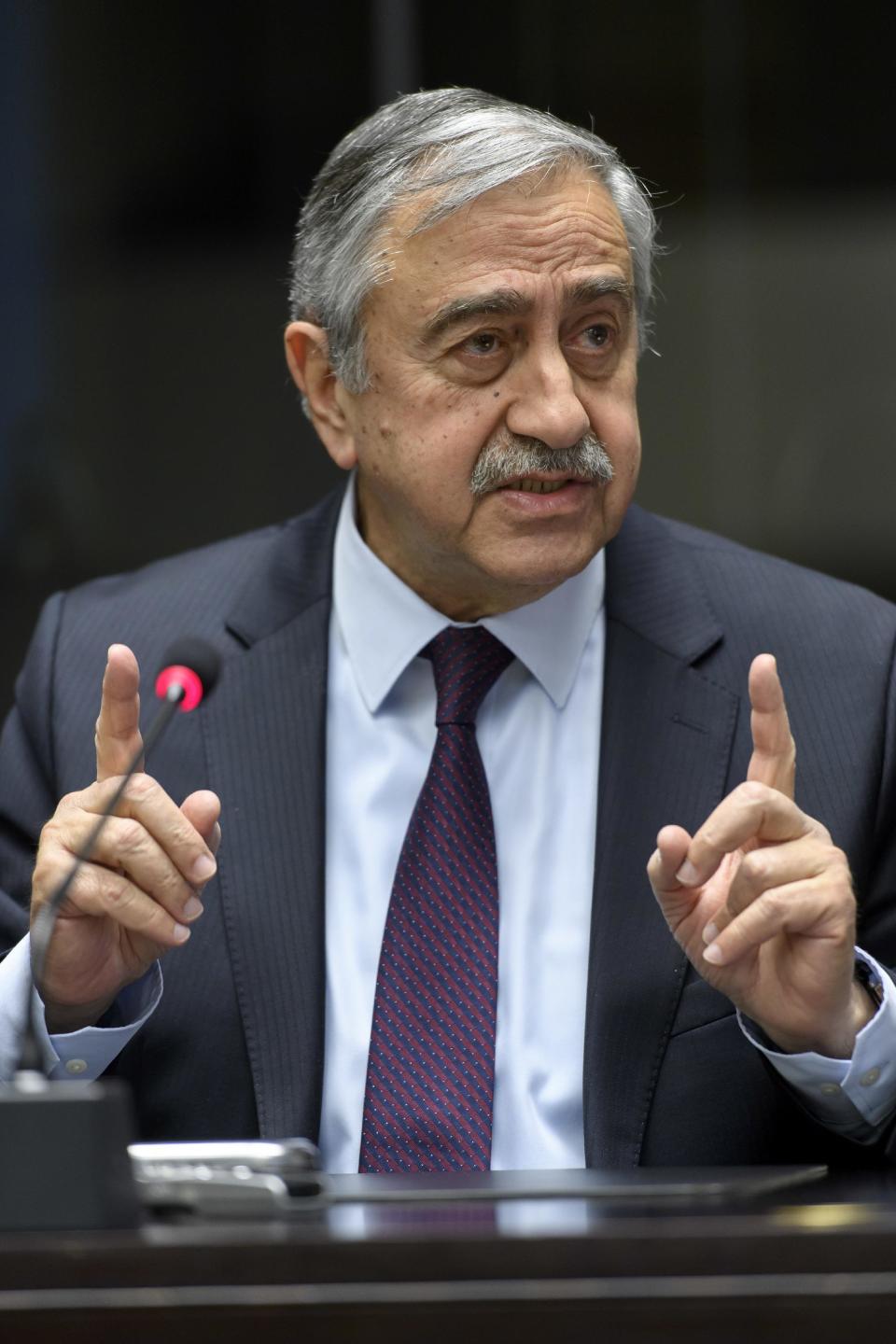 Turkish Cypriot leader Mustafa Akinci speaks to the media about the Cyprus Peace Talks, during a press conference at the European headquarters of the United Nations in Geneva, Switzerland, on Friday, Jan. 13, 2017. (Martial Trezzini/Keystone via AP)