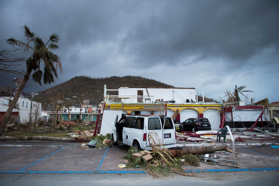 A picture shows a wrecked car in the streets of Marigot, on Sept. 9 in St. Martin island devastated by Irma hurricane. (Photo: MARTIN BUREAU via Getty Images)