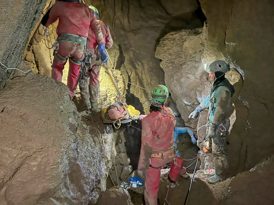 Members of the CNSAS, Italian alpine and speleological rescuers, carry a stretcher with American researcher Mark Dickey during a rescue operation in the Morca cave, near Anamur, southern Turkey, Monday, Sept. 11, 2023. A rescue operation is underway in Turkey’s Taurus Mountains to bring out an American researcher who fell seriously ill at a depth of some 1,000 meters (3,000 feet) from the entrance of one of world’s deepest caves last week and was unable to climb out himself. Mark Dickey is being assisted by international rescuers who by Monday had brought him up to 300 meters (nearly 1,000 feet). (CNSAS Via AP)