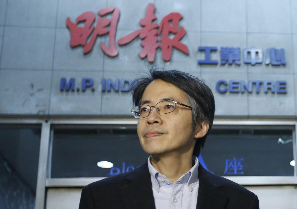 In this January 13, 2014 photo, former Ming Pao chief editor Kevin Lau Chun-to is seen outside his office building in Hong Kong. The former editor of a Hong Kong newspaper whose abrupt dismissal in January sparked protests over press freedom has been stabbed, police said on Wednesday. Police said a man wearing a motorcycle helmet “suddenly” attacked Kevin Lau on Wednesday morning with a knife and then fled on a motorcycle driven by another man. (AP Photo/Str) HONG KONG OUT