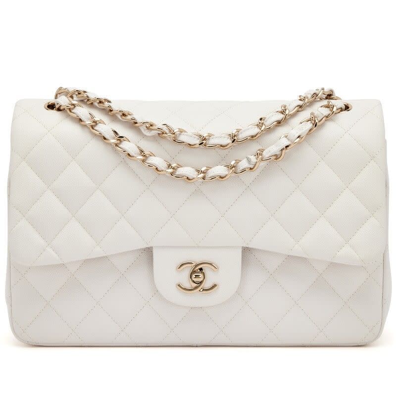 <p><a href="https://www.sothebys.com/en/buy/_chanel-cream-white-quilted-caviar-jumbo-classic-double-flap-light-gold-hardware-2020" rel="nofollow noopener" target="_blank" data-ylk="slk:Shop Now;elm:context_link;itc:0;sec:content-canvas" class="link ">Shop Now</a></p><p>Jumbo Classic Double-Flap Bag</p><p>sothebys.com</p><p>$8200.00</p>