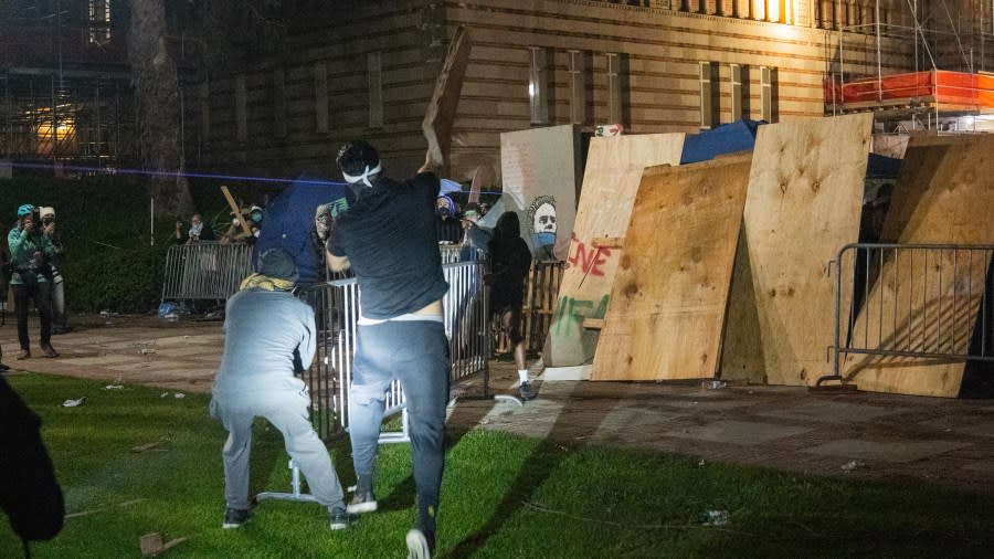 Israeli Protesters Laid Siege On The UCLA Gaza Support Camp For Over 4 Hours. The Israeli Protesters Used Make Shift Weapons, Chemical Weapons And Fireworks To Assault The Camp All Night Long, in Los Angeles, on May 1, 2024.(Photo by Shay Horse/NurPhoto via Getty Images)