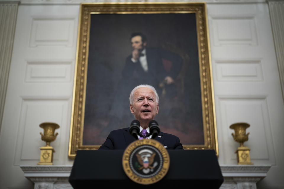 WASHINGTON, DC - JANUARY 21:  President Joe R. Biden, with Vice President Kamala Harris by his side, speaks about the COVID-19 coronavirus pandemic before signing executive orders in the State Dining Room at the White House on Thursday, Jan 21, 2021 in Washington, DC. (Photo by Jabin Botsford/The Washington Post via Getty Images)