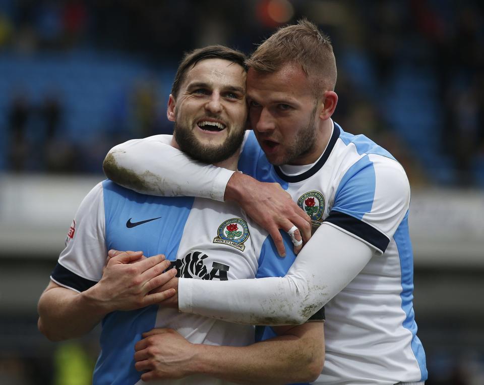 Blackburn Rovers' Craig Conway (L) celebrates after scoring his team's third goal with Jordan Rhodes during their FA Cup fourth round soccer match against Swansea City at Ewood Park in Blackburn, northern England January 24, 2015. REUTERS/Andrew Yates (BRITAIN - Tags: SPORT SOCCER)