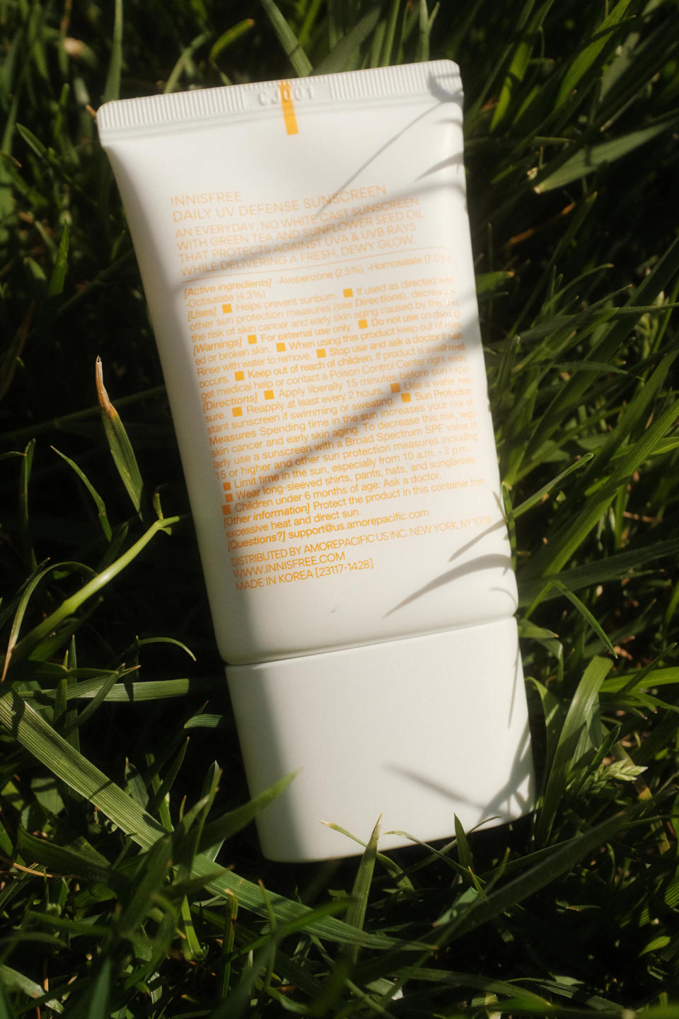 The back of an Innisfree brand bottle of sunscreen. (Chelsea Stahl and Elise Wrabetz / NBC News)