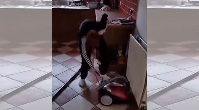 An Irish dad humours his young son who can't figure out how to start a vacuum cleaner. Source: YouTube/Meanwhile in Ireland