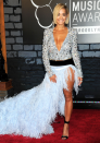 Best dressed: Rita Ora looked show-stopping in a plunging Alexandre Vauthier sequinned gown with feather train.