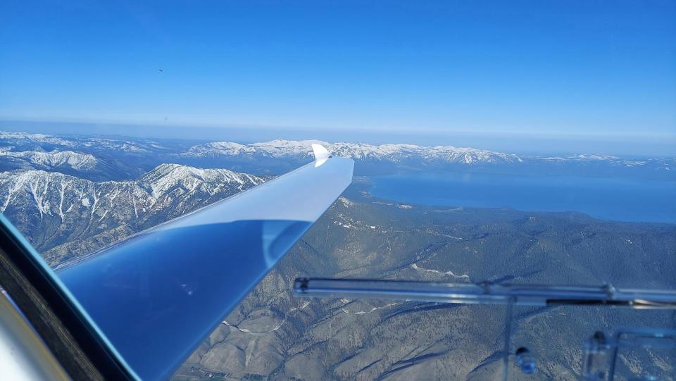 Sarasota-based test pilot and engineer Miguel Iturmendi captured two world records on June 2, when he piloted the Helios Horizon above the Sierra Nevada Mountain range near Lake Tahoe, Nevada. This camera shows a view of the mountain range and lake. For the record-setting flight, Iturmendi flew the electric plane with two batteries to a height of 16,023 feet, then set a second record by maintaining a level, precision flight for three minutes.