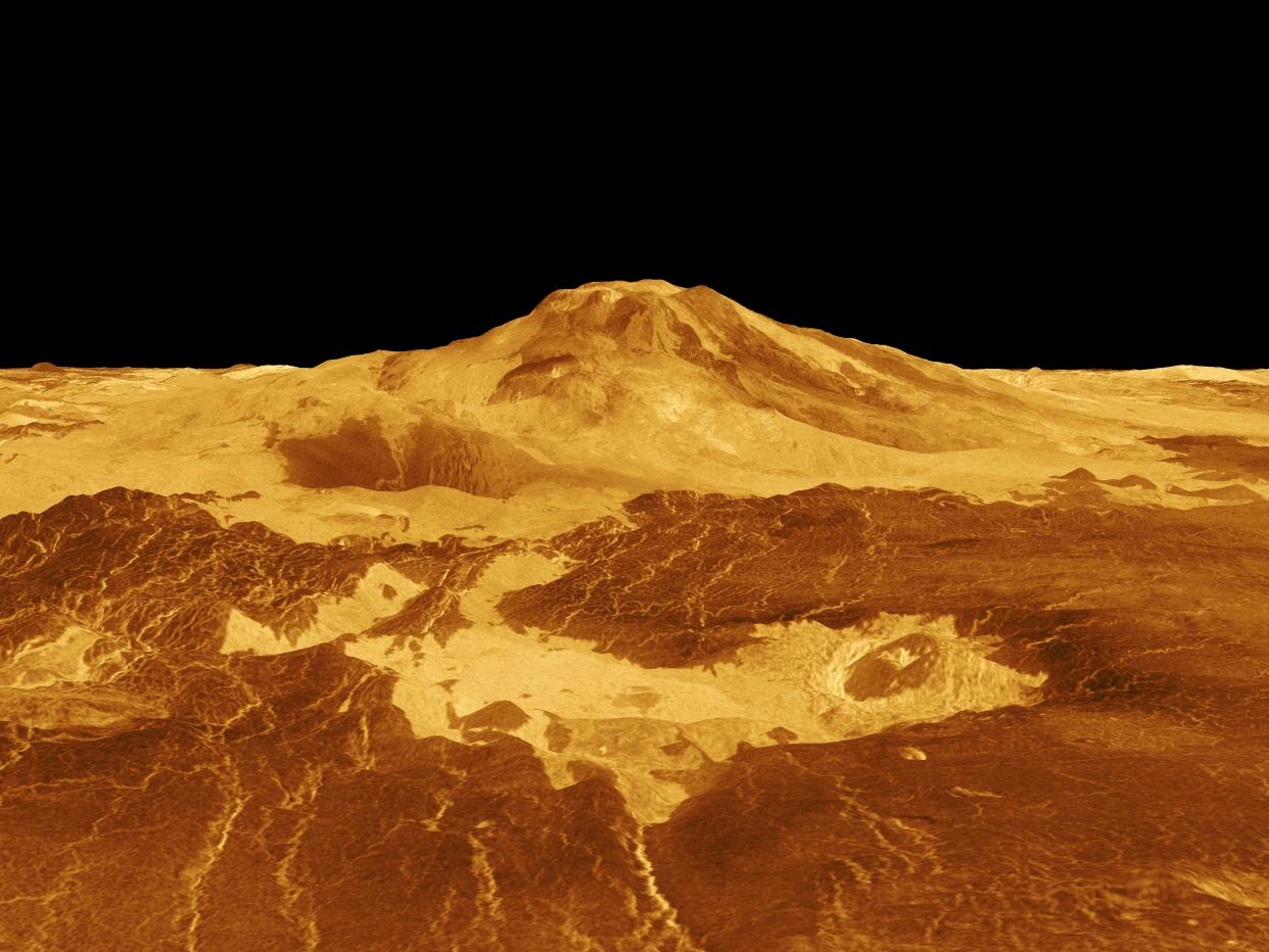  Maat Mons is displayed in this computer generated three-dimensional perspective of the surface of Venus. The viewpoint is located 393 miles (634 kilometers) north of Maat Mons at an elevation of 2 miles (3 km) above the terrain. Lava flows extend for hundreds of kilometers across the fractured plains shown in the foreground, to the base of Maat Mons.  