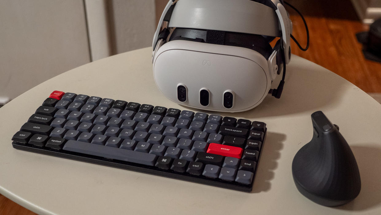  A Meta Quest 3 headset with a Bluetooth connected Keychron keyboard and Logitech MX Vertical mouse. 