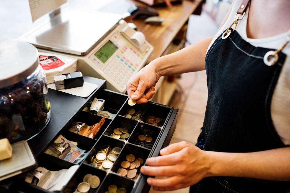 <p>Getty</p> A stock image of a cashier