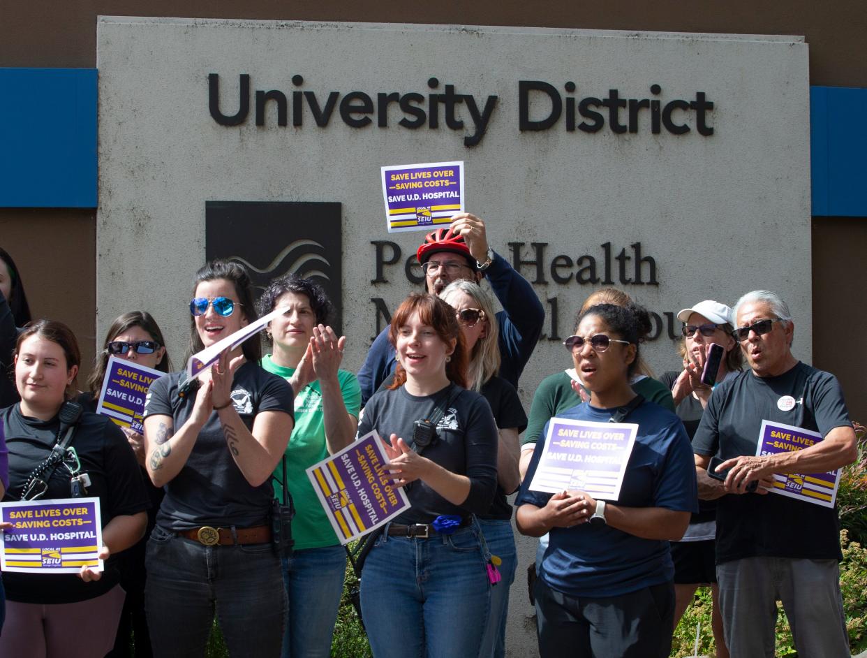 Hospital workers, elected officials and community members on Monday protest the announced closure of the PeaceHealth Sacred Heart Medical Center University District during a rally near the hospital in Eugene.