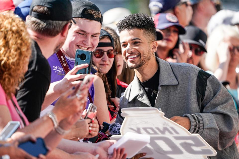 From Hamilton 2026, actor, singer, dancer and musician Jordan Fisher walks the red carpet during the 106th running of the Indianapolis 500 at Indianapolis Motor Speedway.