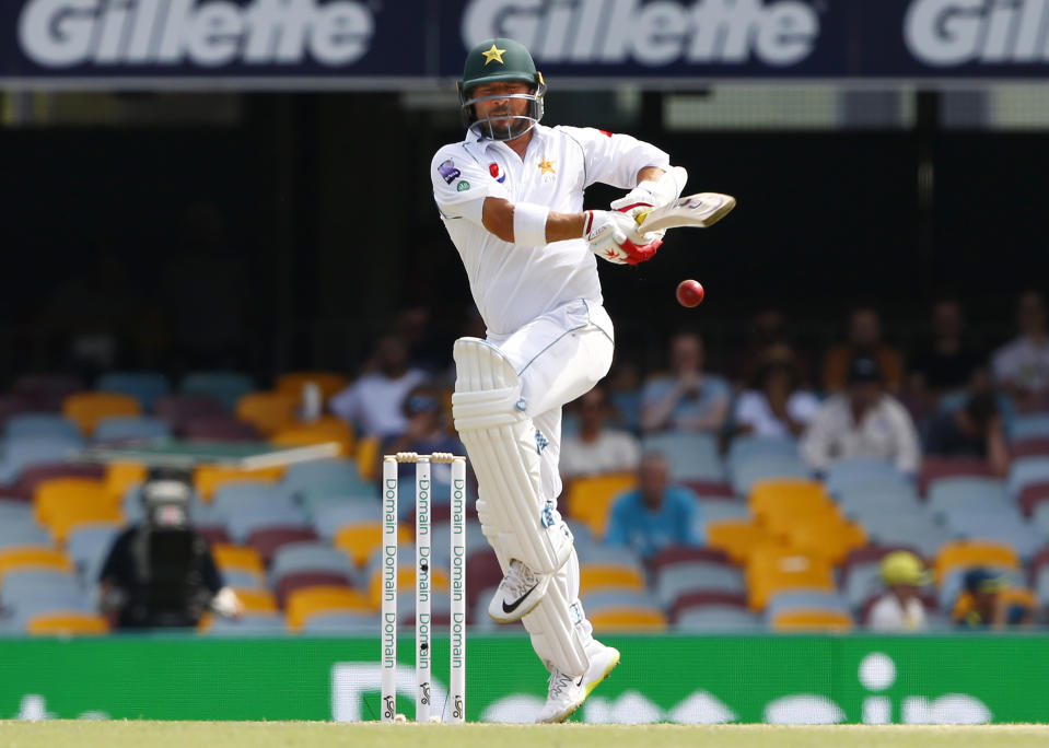 Pakistan's Yasir Shah plays a shot during their cricket test match against Australia in Brisbane, Australia, Sunday, Nov. 24, 2019. (AP Photo/Tertius Pickard)