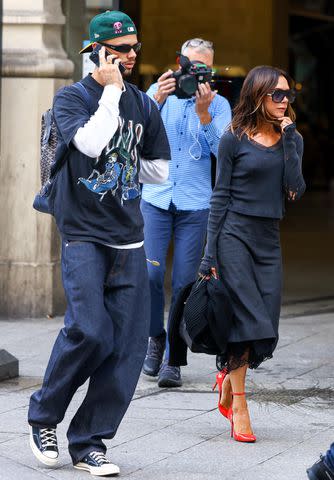 <p>Marc Piasecki/GC Images</p> Romeo Beckham and Victoria Beckham