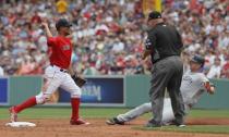 Jul 16, 2017; Boston, MA, USA; New York Yankees left fielder Brett Gardner (11) out at second on a double play by Boston Red Sox shortstop Xander Bogaerts (2) in the third inning at Fenway Park. Mandatory Credit: David Butler II-USA TODAY Sports