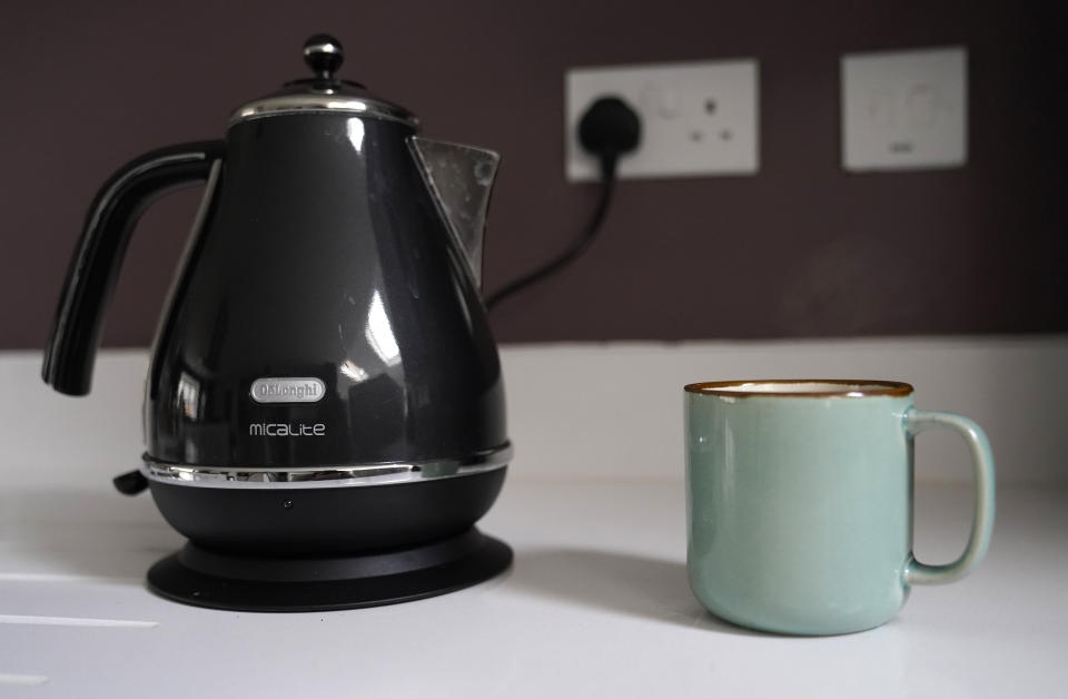 Ofgem  General view of a DeLonghi kettle next to a cup of coffee in a kitchen in Basingstoke, Hampshire. Ofgem is expected to announce that the energy price cap is to rise by 50 percent because of soaring wholesale gas prices, meaning the average bill could hit �1,915. Picture date: Thursday February 3, 2022.