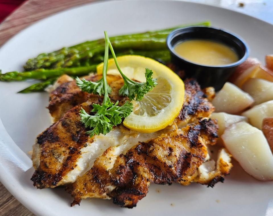 Blackened red snapper at Dry Dock Waterfront Grill on Longboat Key photographed July 9, 2023.