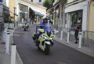 Police officers on motorcycles patrol on deserted streets ahead of the G-7 summit in Biarritz, France Friday, Aug. 23, 2019. U.S. President Donald Trump will join host French President Emmanuel Macron and the leaders of Britain, Germany, Japan, Canada and Italy for the annual G-7 summit in the elegant resort town of Biarritz. (AP Photo/Markus Schreiber)