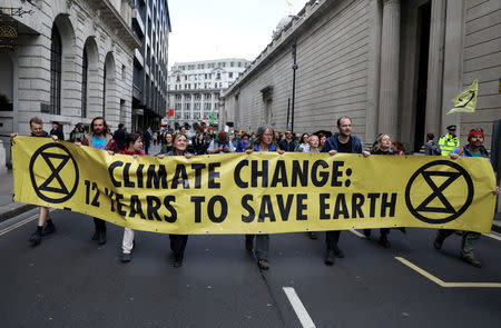 Protesters block traffic outside The Bank of England during the Extinction Rebellion protest in London, Britain April 25, 2019. REUTERS/Simon Dawson